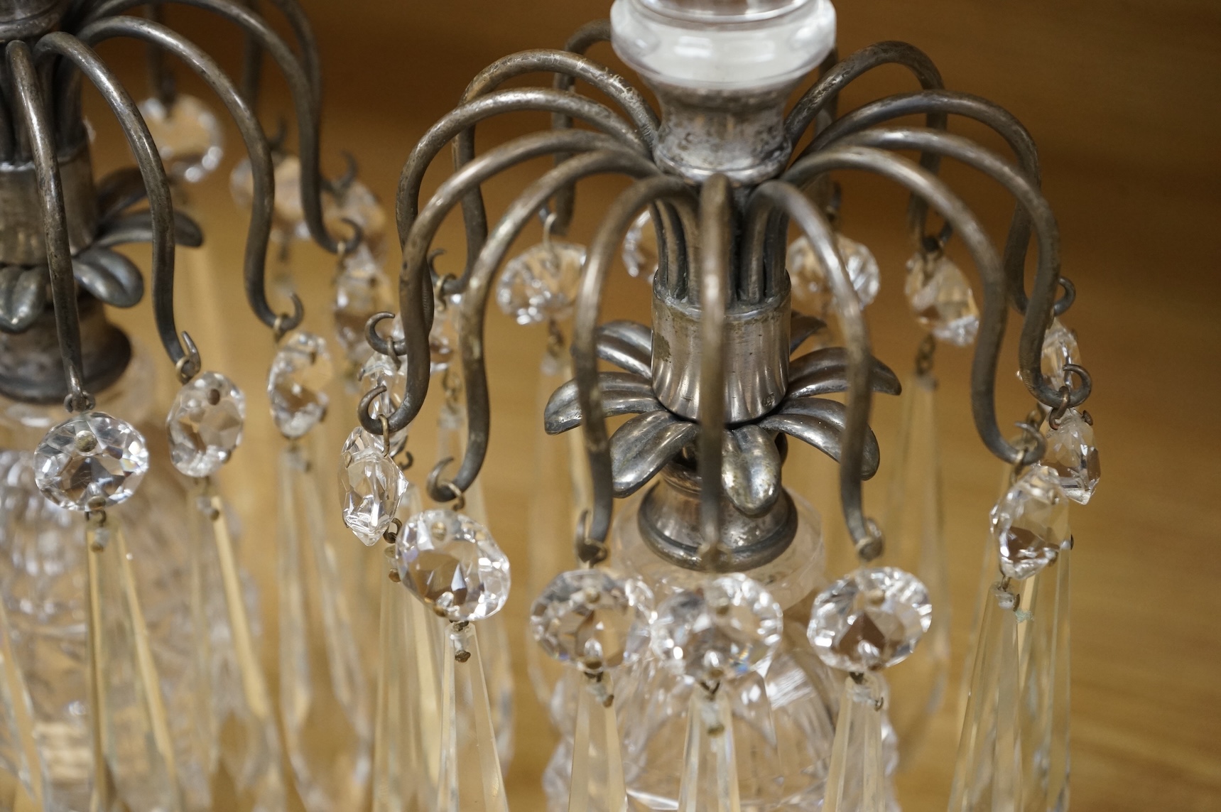 A pair of Victorian cut glass table lustres, probably Berry & Co., in Regency style, converted for electricity, 29cm high